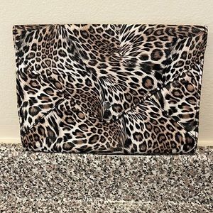 Leopard print clutch with pink interior...brand:unknown